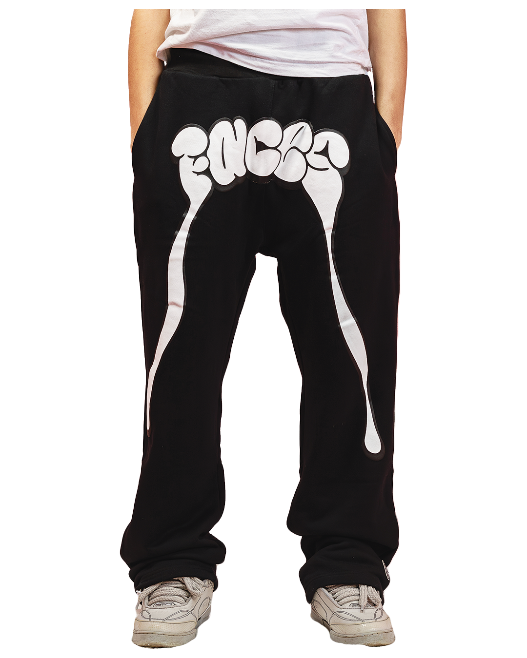 Black sweatpants with oversized white graphic spelling “FACES” across the waist and dripping extensions down the legs.