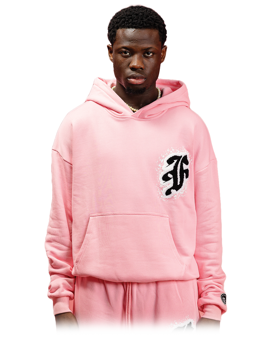 pink hoodie featuring a bold black gothic “F” logo on the chest, surrounded by a distressed white print effect.