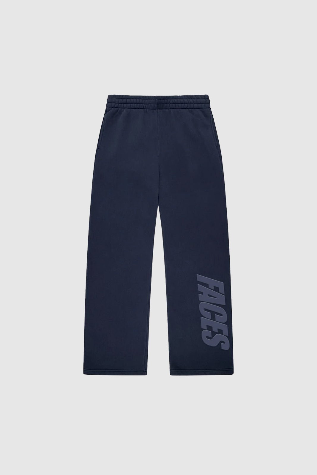 Navy blue sweatpants with vertical FACES logo on leg, front view